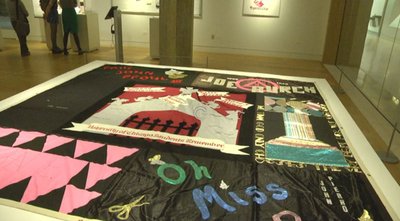 The UChicago square of the AIDS Quilt on display in the Special Collections Exhibition Gallery