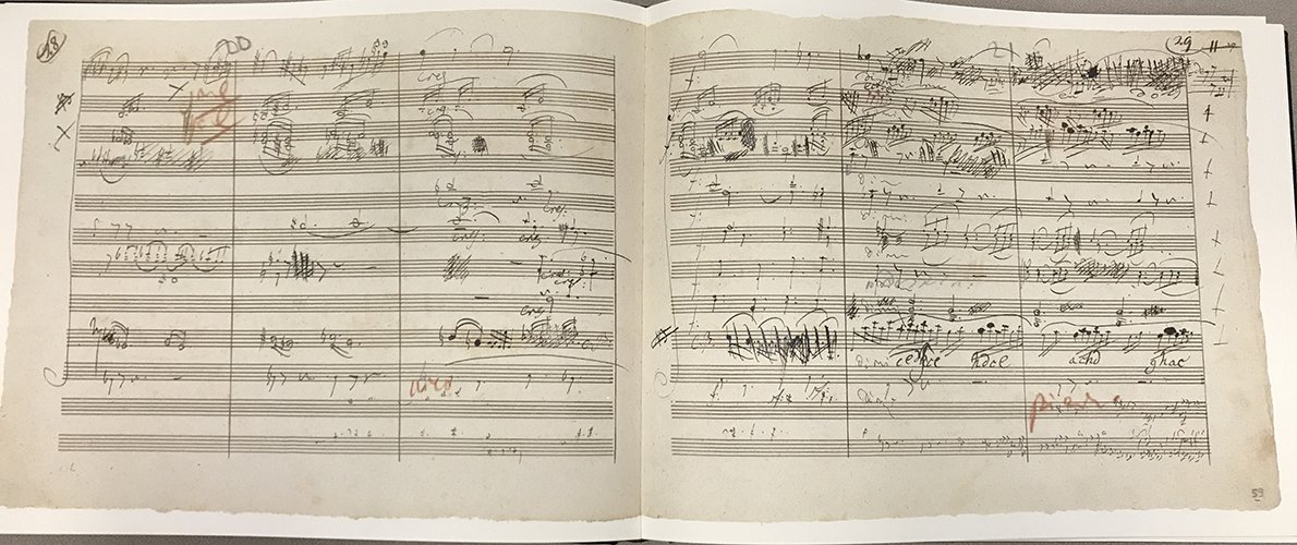 Open page to the composer's handwritten manuscript