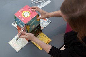 Hands hold an interactive book