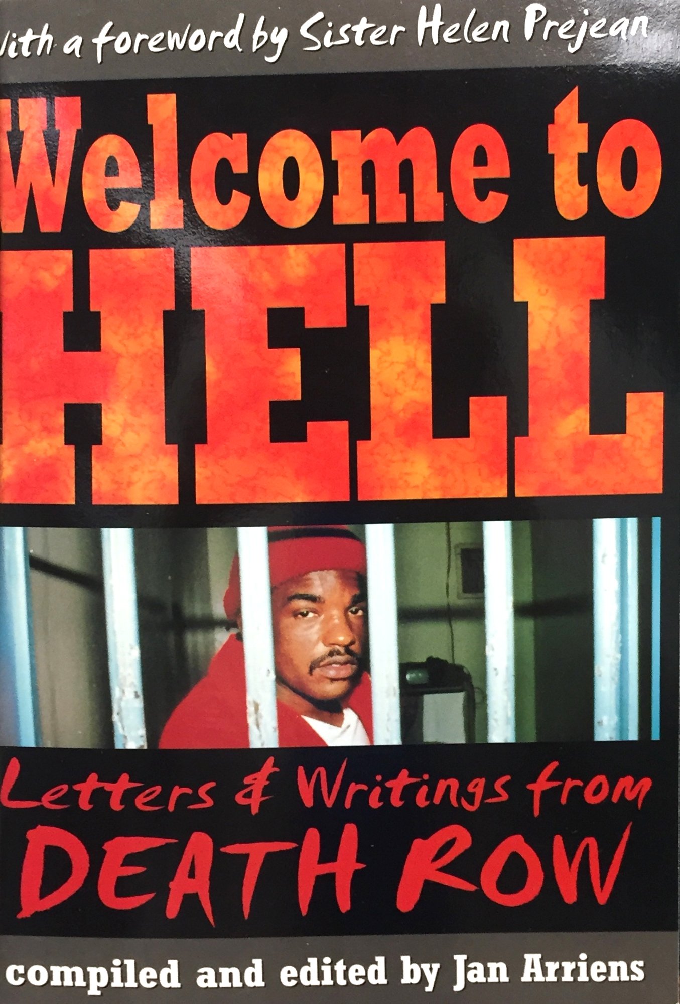 "Welcome to Hell" written in bold letters with overlaid with fire. Below, a picture of a black man behind bars.
