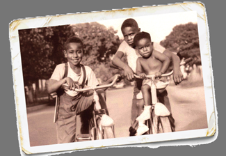 Emmett Till (left) and Wheeler Parker Jr. (right) riding bicycle