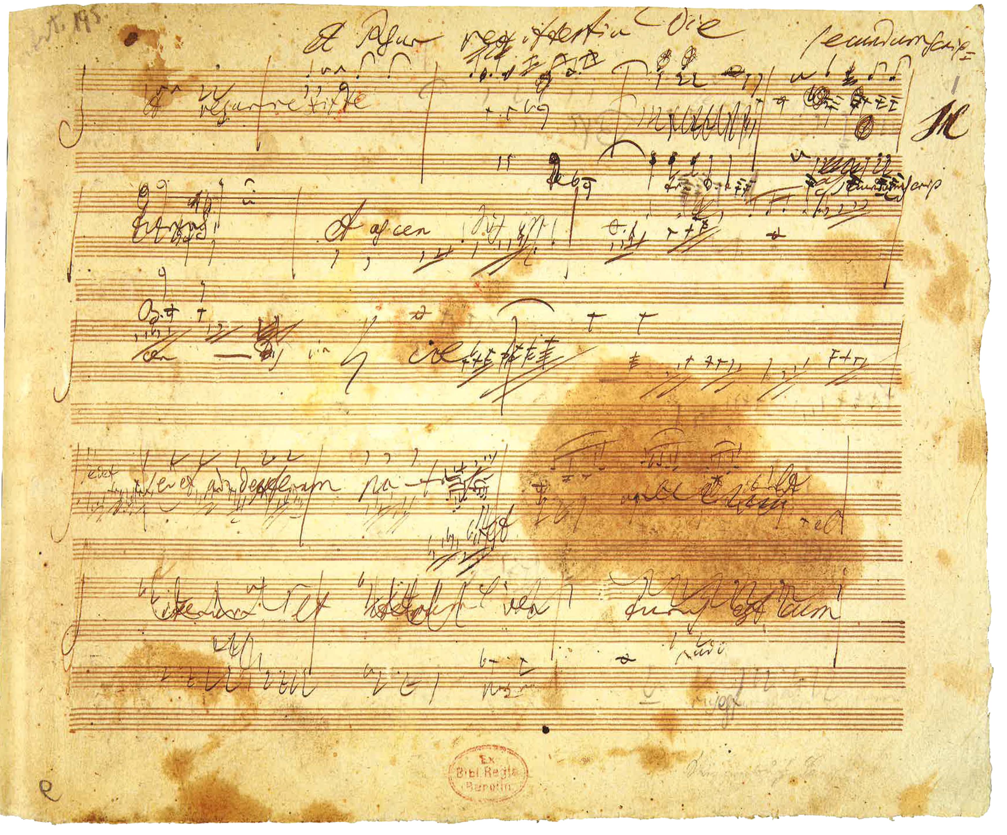 A page of extremely smudged and yellowed sheet music.
