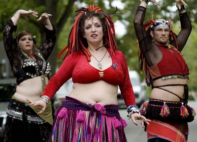 Dancers from Different Drummer Bellydance troupe perform at a street festival in Bloomington, IN.  (Photo by Adam Zolkover.)