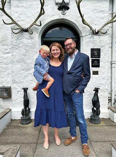 Jenna Anderson (center) with her husband and small son