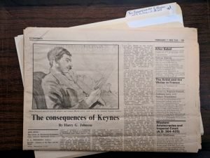 Folded newspaper showing article on The Consequences of Keynes.