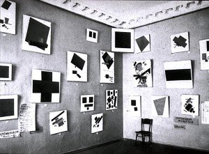 Photograph of works displayed on walls.