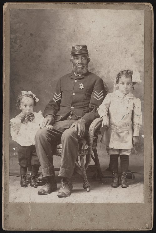 Unidentified African American Union Veteran with 2 children ca 1900