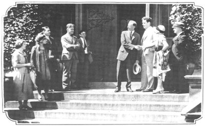 Max Mason greeting students, Chicago Daily News, August 29, 1925