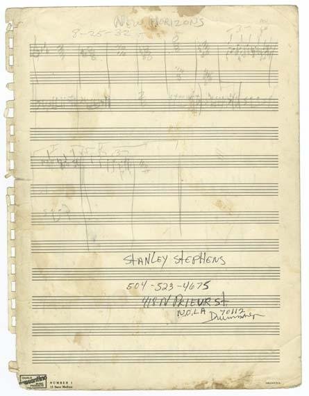Some handwritten music notes on staffs.