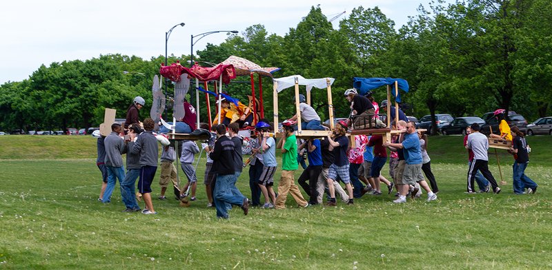 A large group of students form a "human elephant"