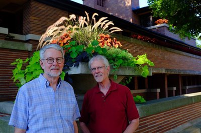 Sem Sutter and John Easton stand together in front of Robie House