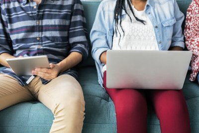 students using a laptop and tablet