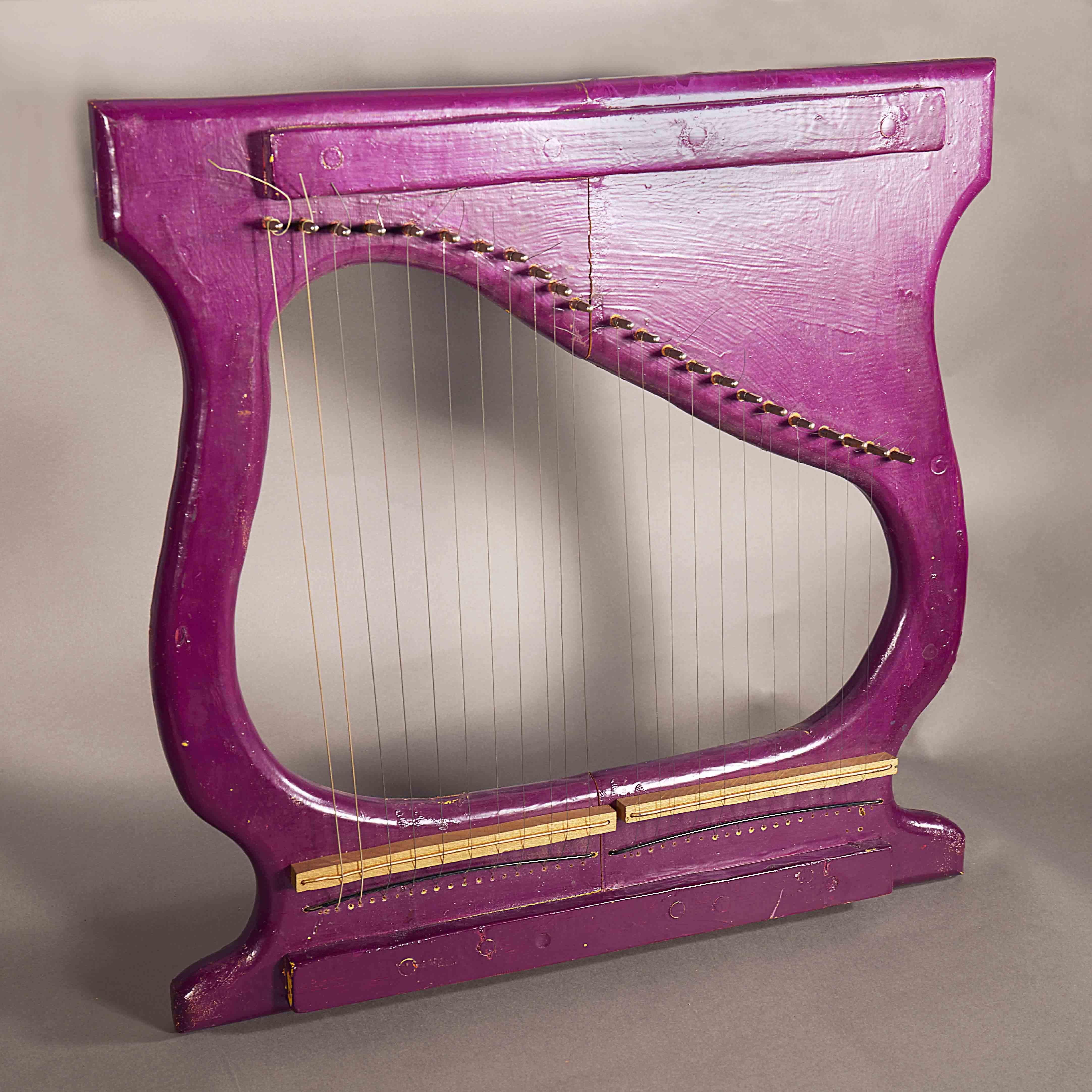 A small magenta harp.