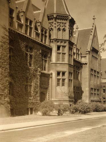 A sepia photo of a Gothic building.