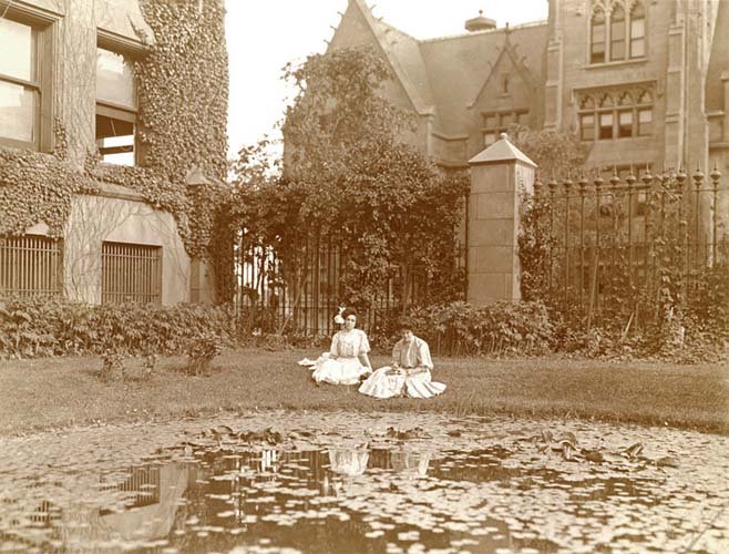 Two women lounge by Botany Pond.