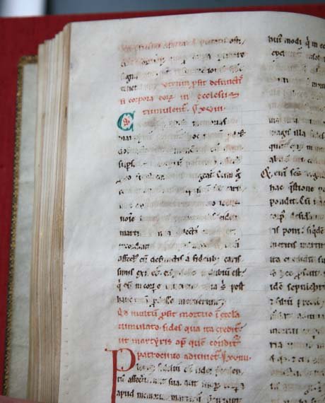 Close-up of page showing how the ink has been rubbed away, making the text illegible