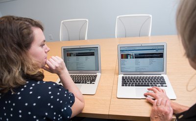 Librarian consults with a student