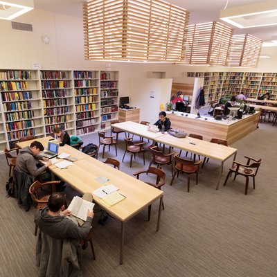Interior of Eckhart Library with bookshelves and study spaces