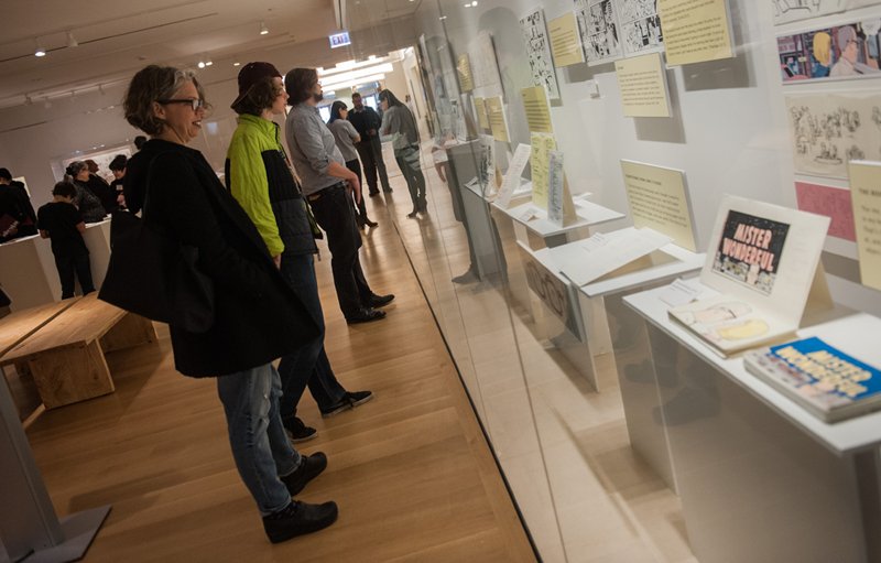 Patrons in the exhibition gallery