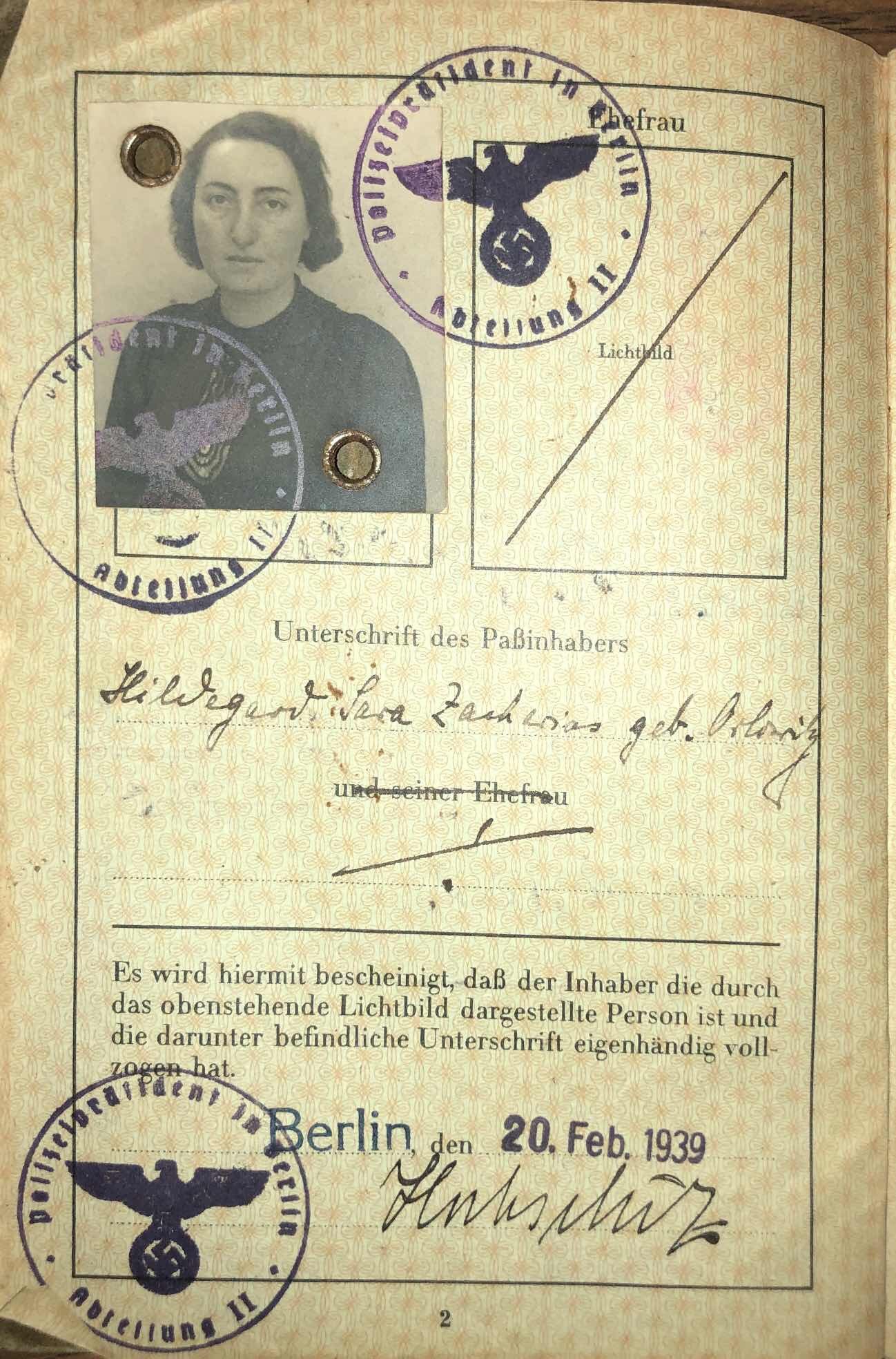 A German passport with the photograph of a woman and her handwritten name.