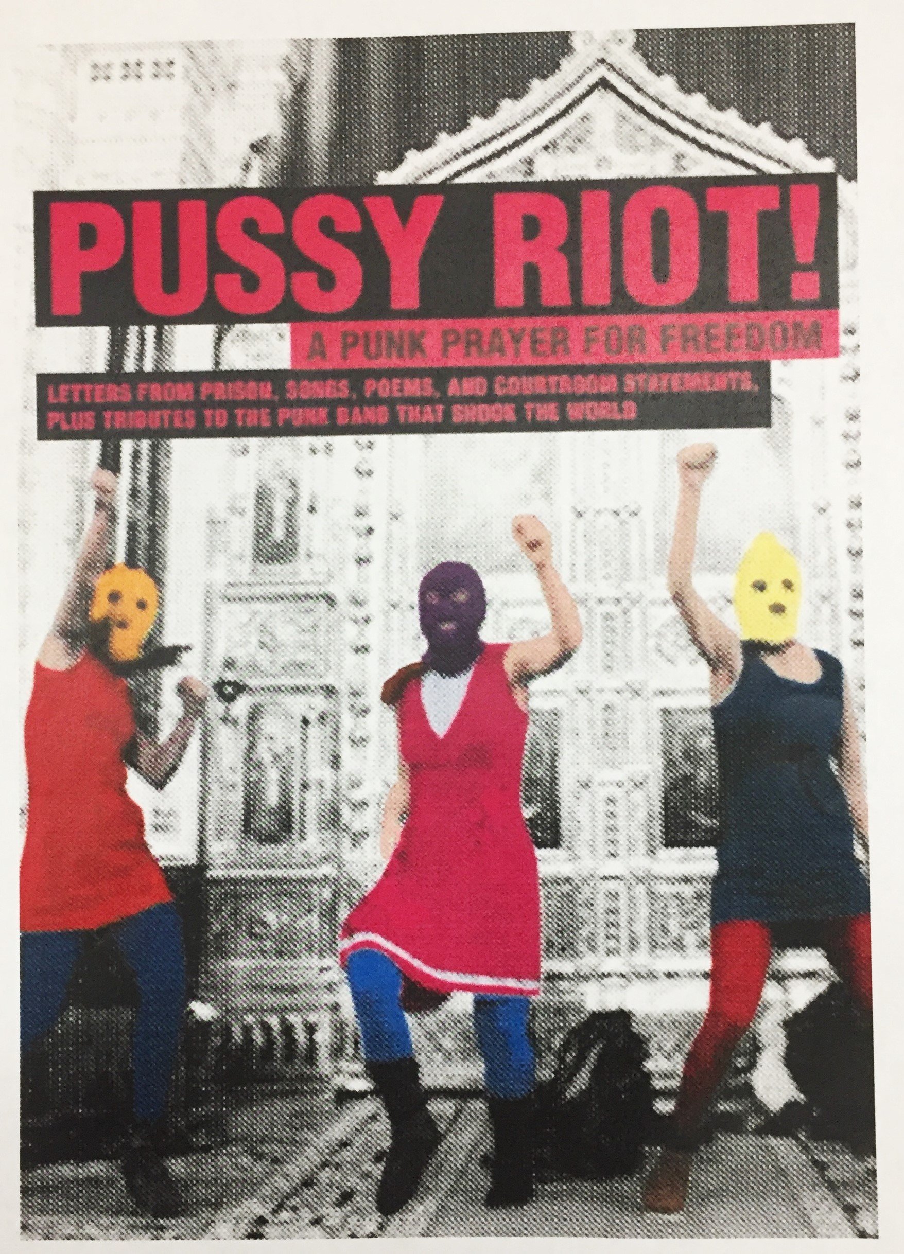 Three women in long tank-tops and leggings with colorful ski masks on, throwing their fists into the air. The words "Pussy Riot!" are printed boldly in red above their heads.