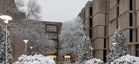 Regenstein Library with snow from Library winter interim hours & winter recess, Dec. 9 – Jan. 1