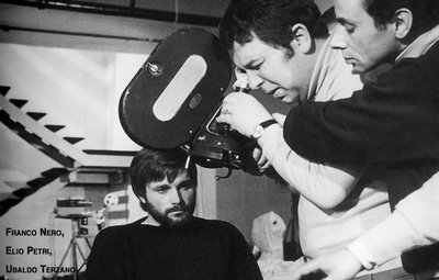 A black and white photograph of Elio Petri.