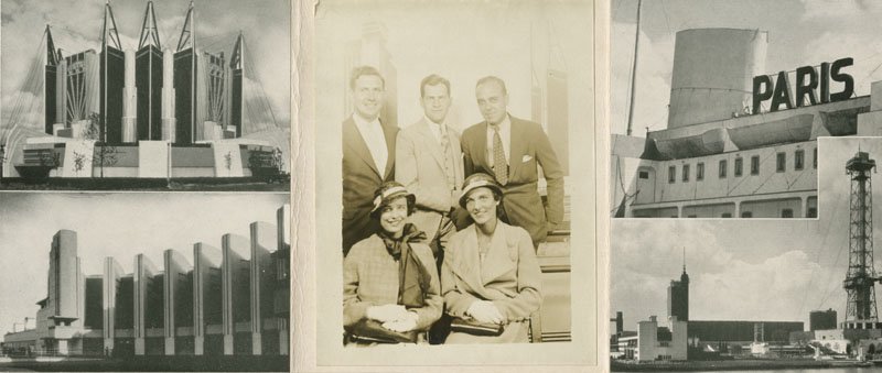 The souvenir photo is pasted in the middle of a cardboard frame depicting the Paris building at the fair. Edward Foss Wilson is a young white man with dark hair wearing a suit. He stands between two other white men in suits. Two women in coats and hats are seated in front of the men.