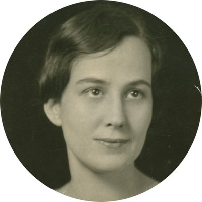 Black-and-white formal photographic portrait of Pauline Wyman Wilson, circa 1920s. She has short, dark, marcelled hair.